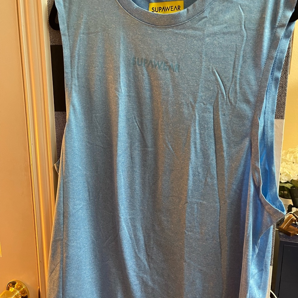 Supawear Brand Blue tank. Never worn in bag and tag. Larger